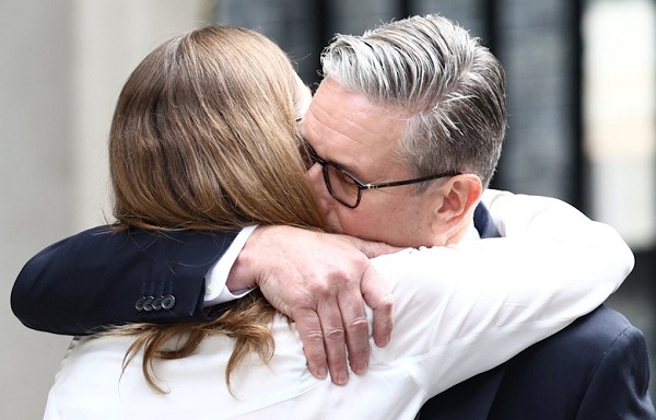 Starmer hugs his wife Victoria